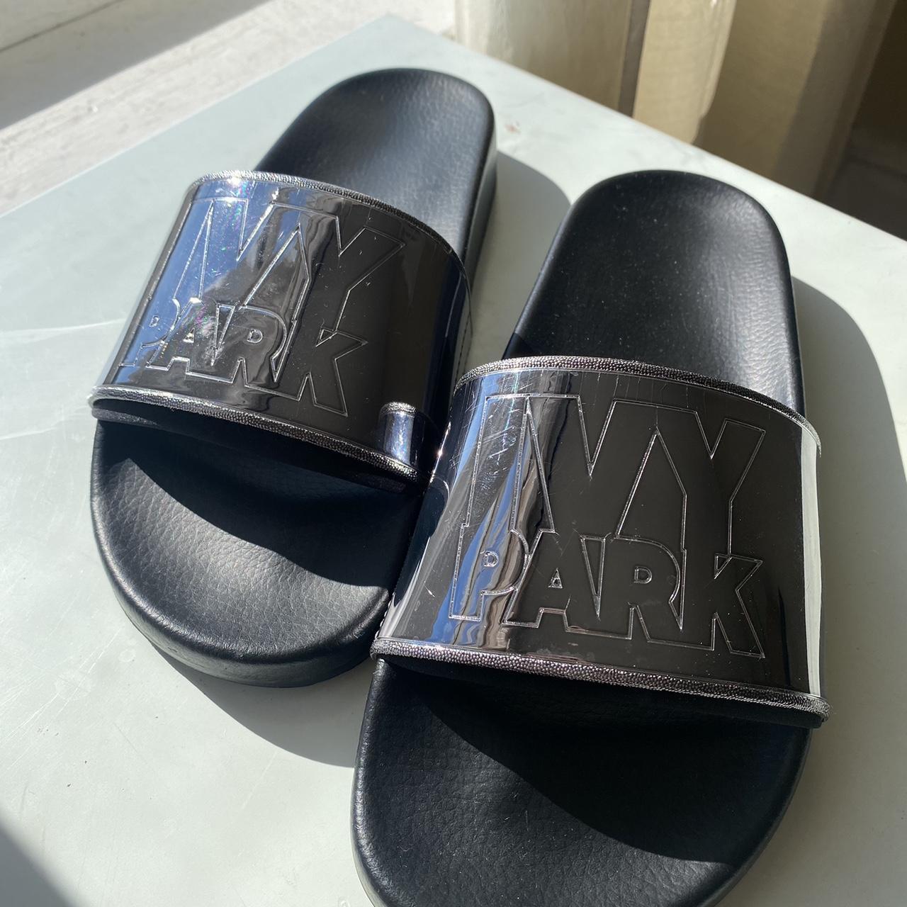 Ivy park flip flops on sale black