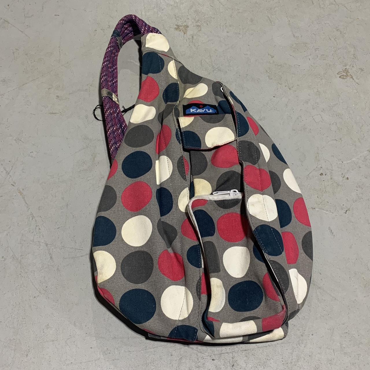 kavu crossbody sling bag has yellow stains on front,... Depop