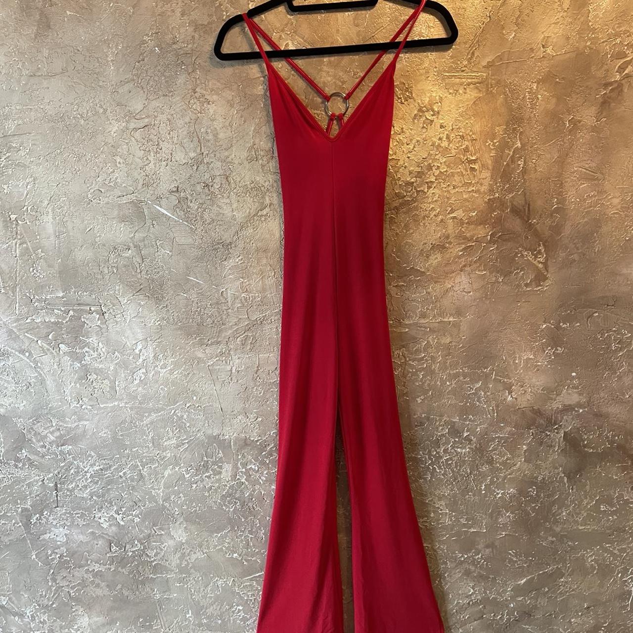 RED JUMPSUIT WITH SLITS