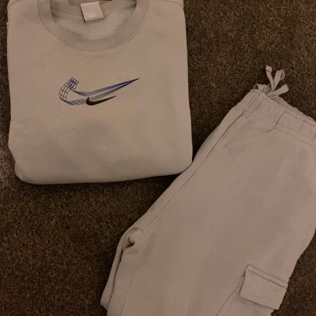 grey nike swoosh tracksuit