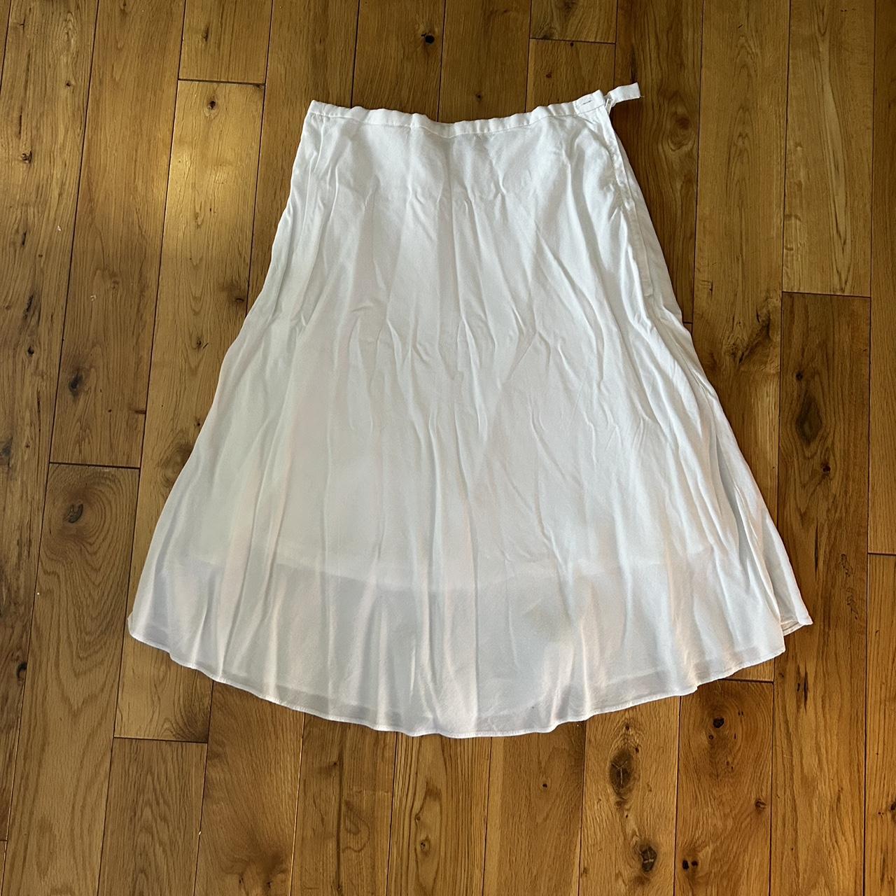 white brandy melville midi skirt has a zipper and... Depop