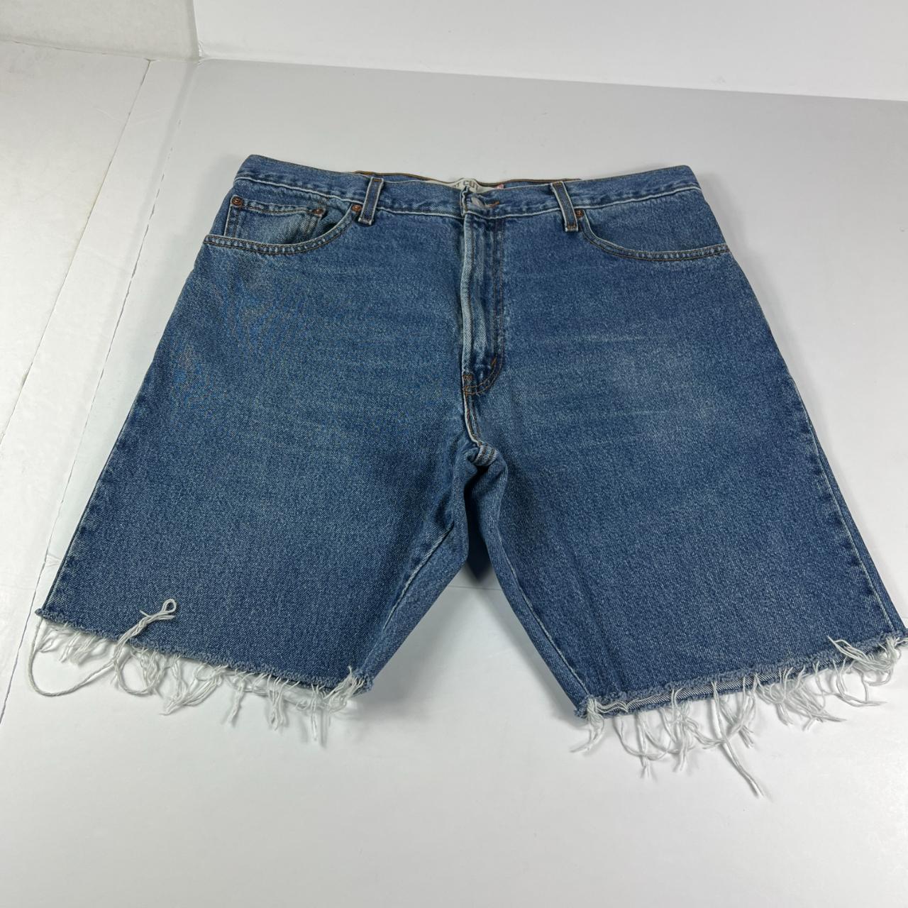 Retro 80's Shorts: 80s -Levis- Mens light blue cotton denim cut off jean  shorts with button/zip front closure, classic four pocket styling and small  e orange tag along rear left patch pocket.