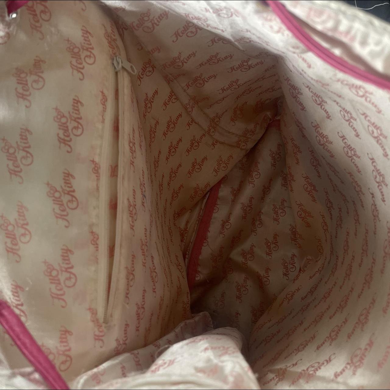 draw string hello kitty bag. the straps are a zipper... Depop