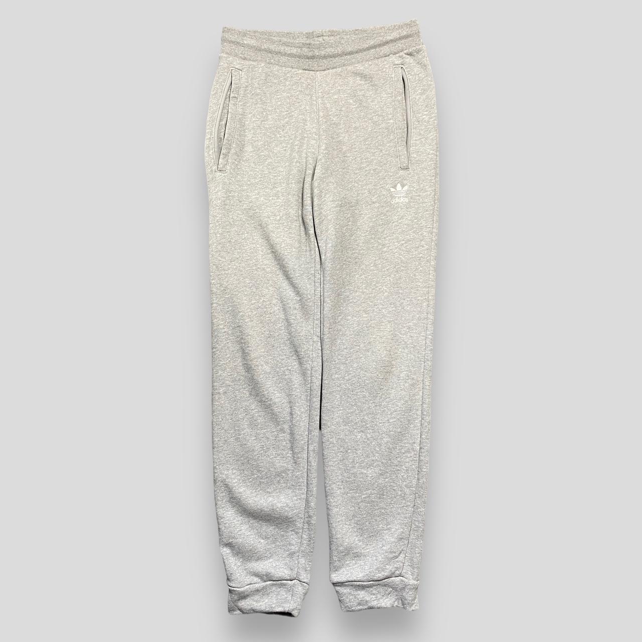 Adidas originals joggers hotsell with logo embroidery grey