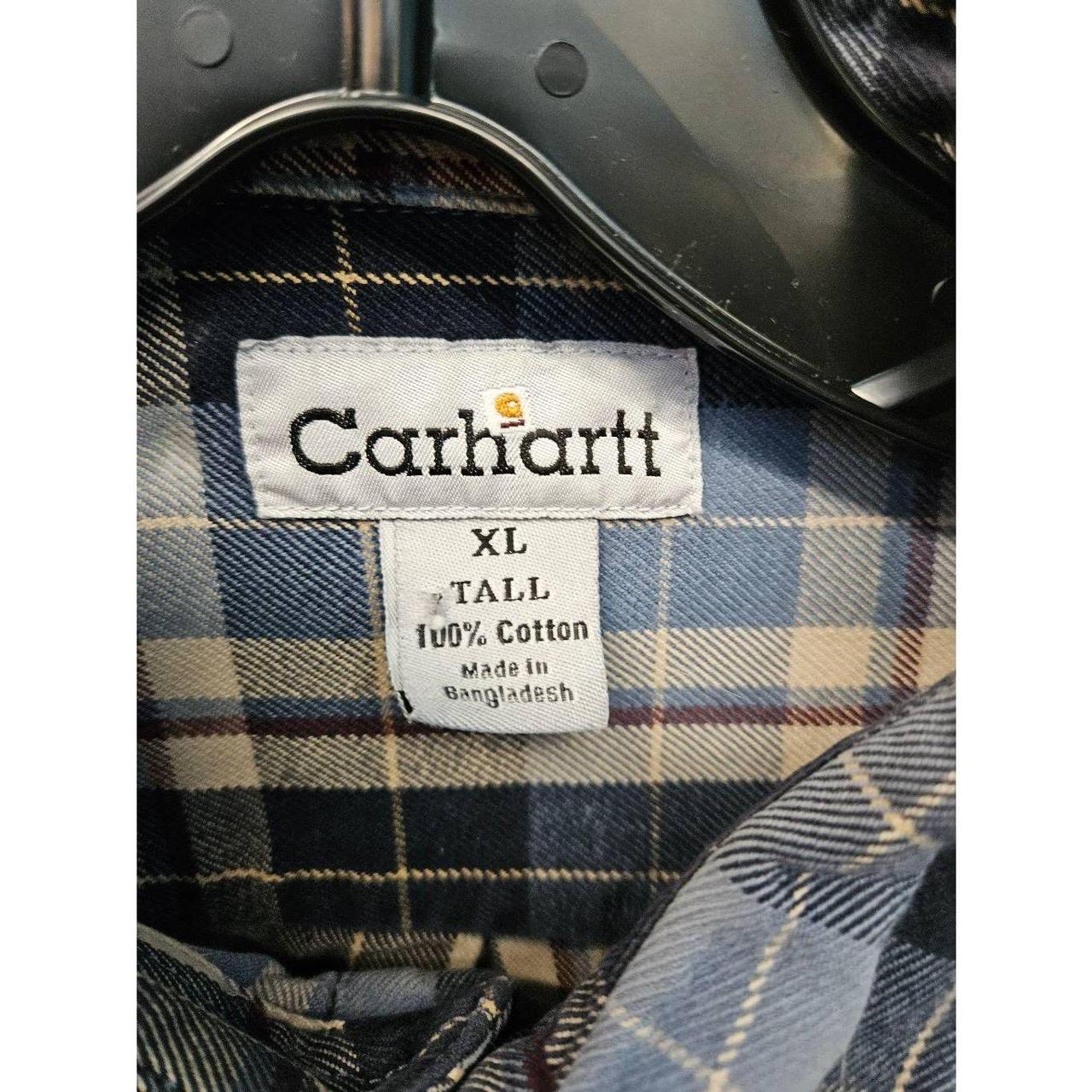 Carhartt tan and blue flannel shirt. Great used... - Depop