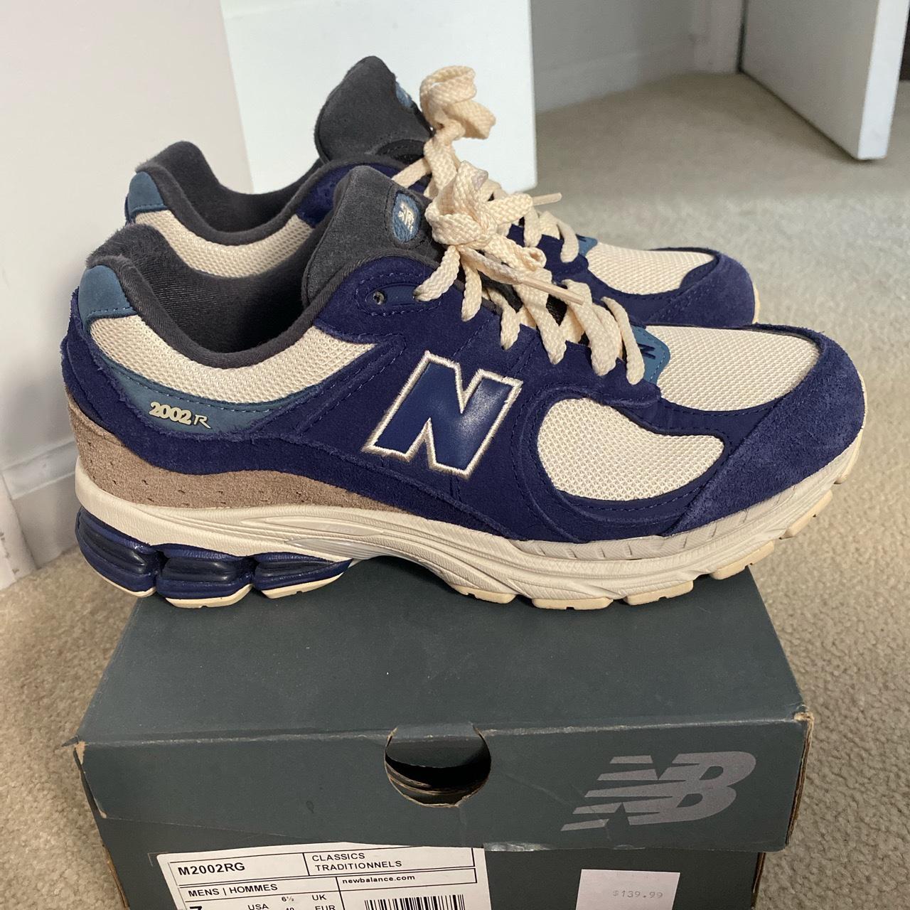 New Balance 2002r in navy/cream size men’s 7/women’s... - Depop