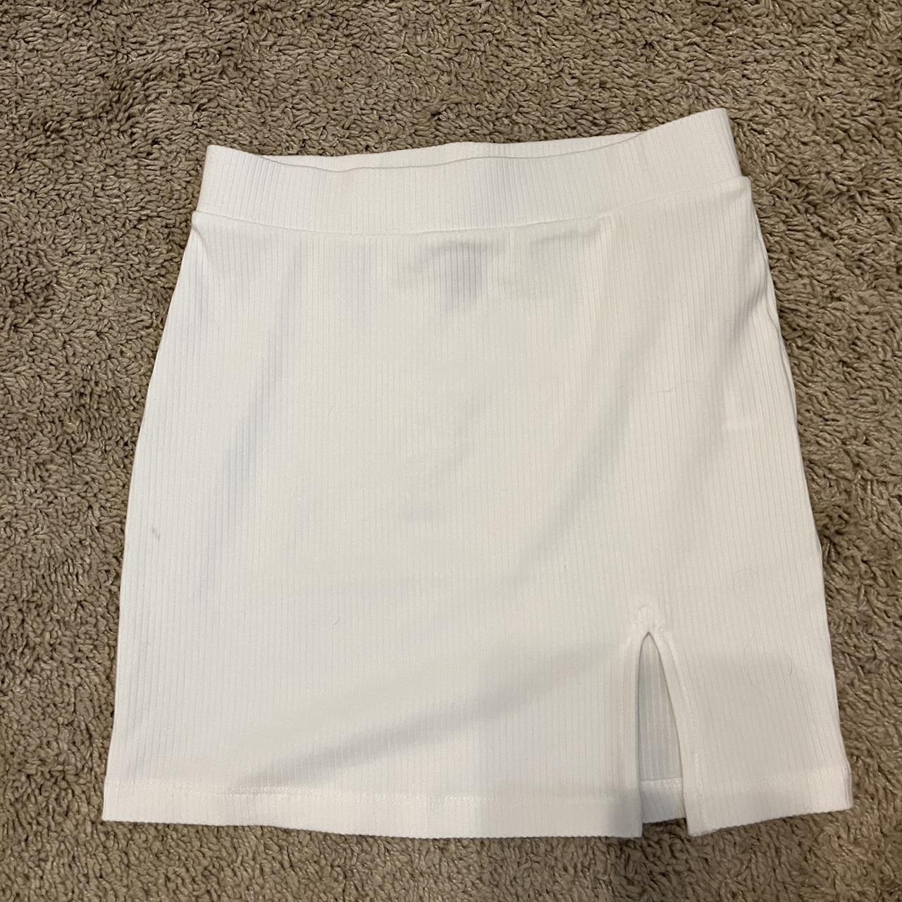 Forever 21 white mini skirt. Stretchy and comfy has... - Depop