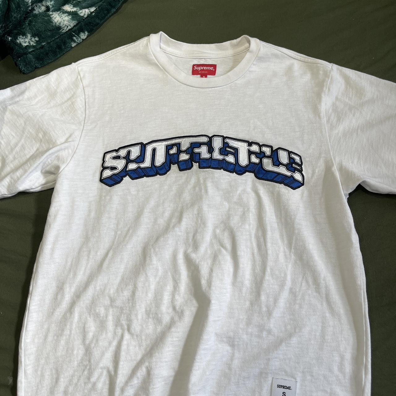 white and blue embroidered supreme logo short