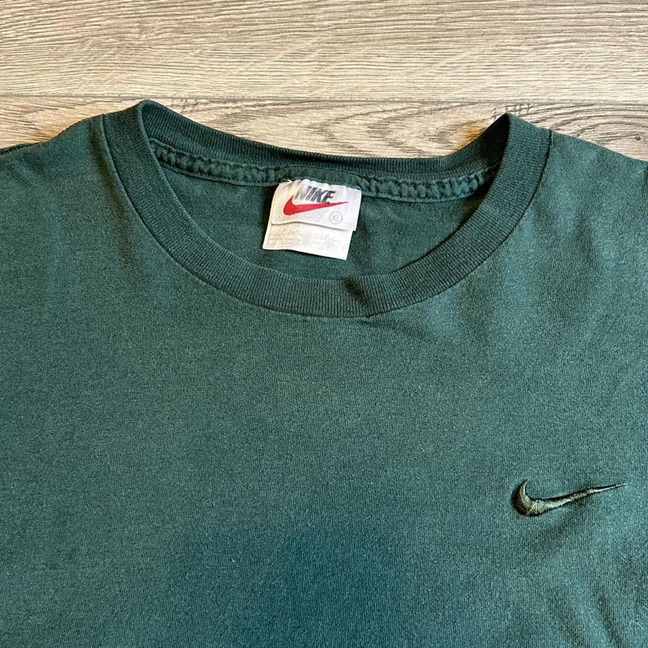 Vintage 90s green nike swoosh shirt. Tag says XL but... - Depop