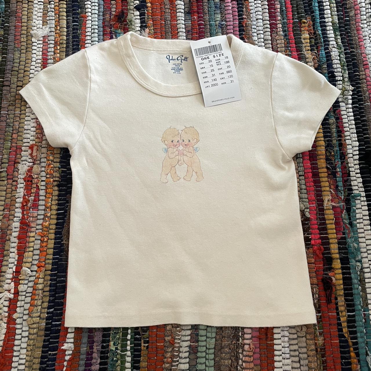 Brandy Melville angel baby tee - white/off white no... - Depop