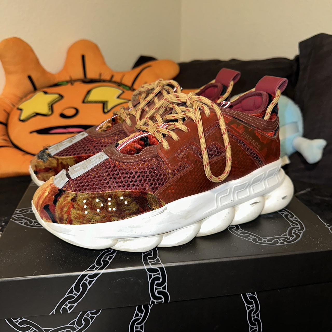 Versace chain discount reaction burgundy