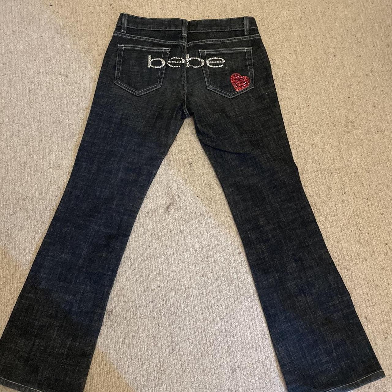 Insane low waisted bebe jeans with rhinestones and... Depop