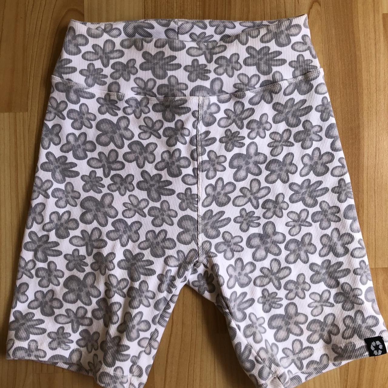 Afends Daisy print white bike shorts size small.... - Depop