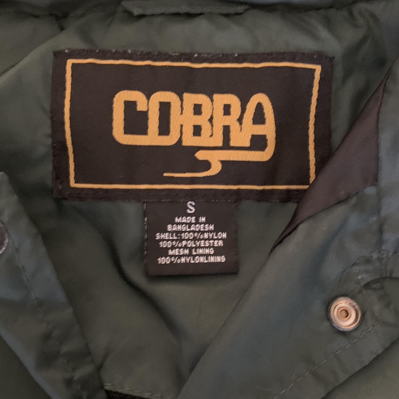 cobra small dark green windbreaker gently used, has... - Depop