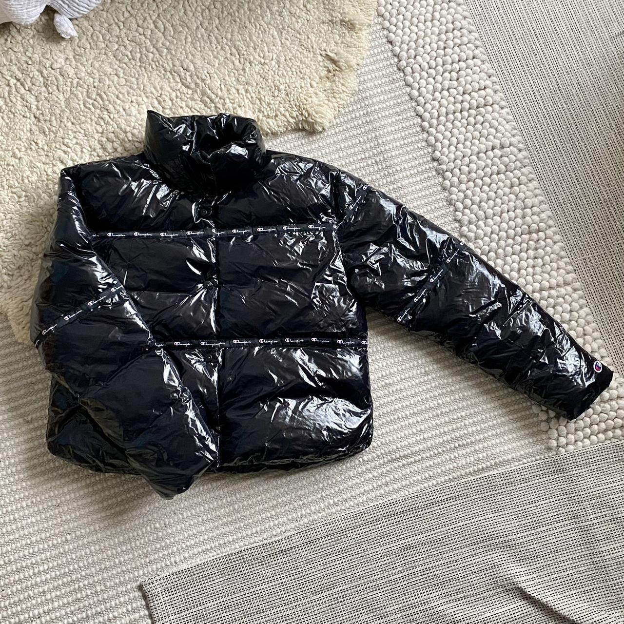 Champion black puffer jacket size M fits a 12 14uk