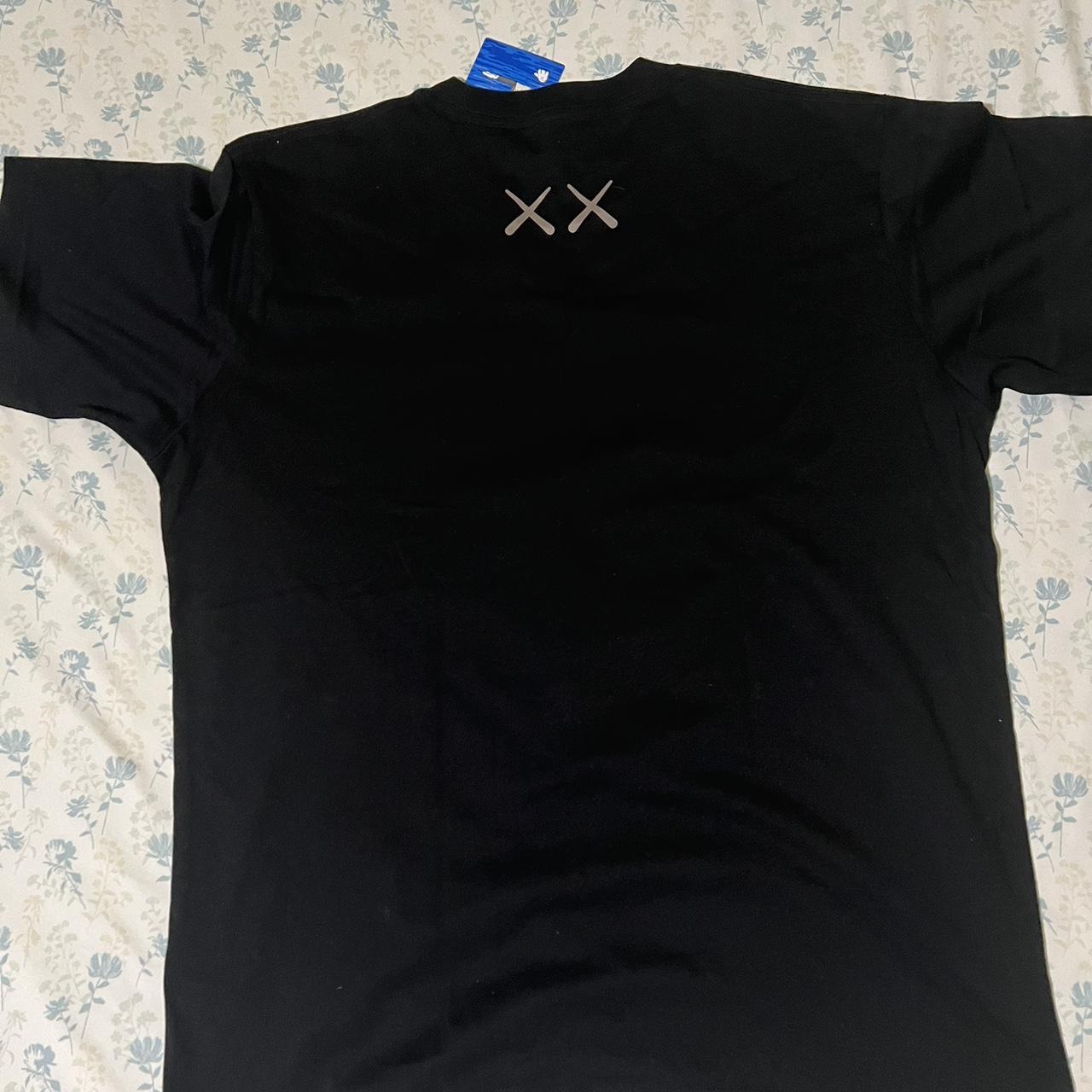 Kaws x Uniqlo T shirt Brand New with Tags Size L Dm... - Depop