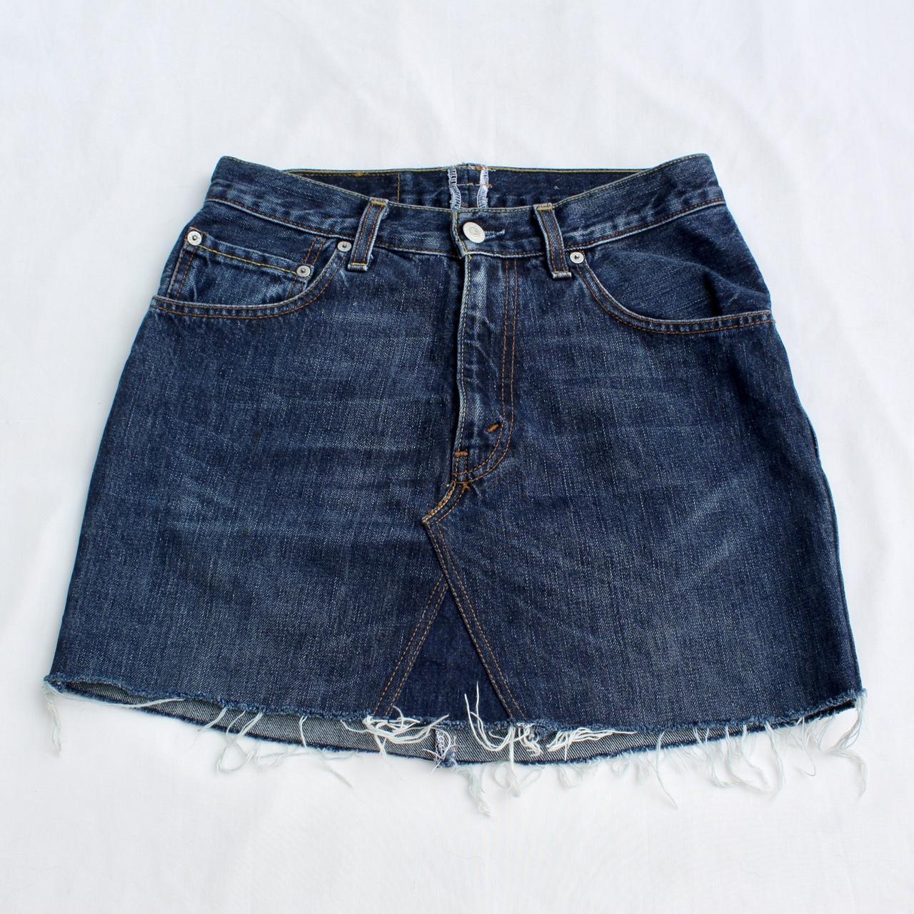 Levis Blue Denim Mini Skirt with Raw Hem Think this... - Depop