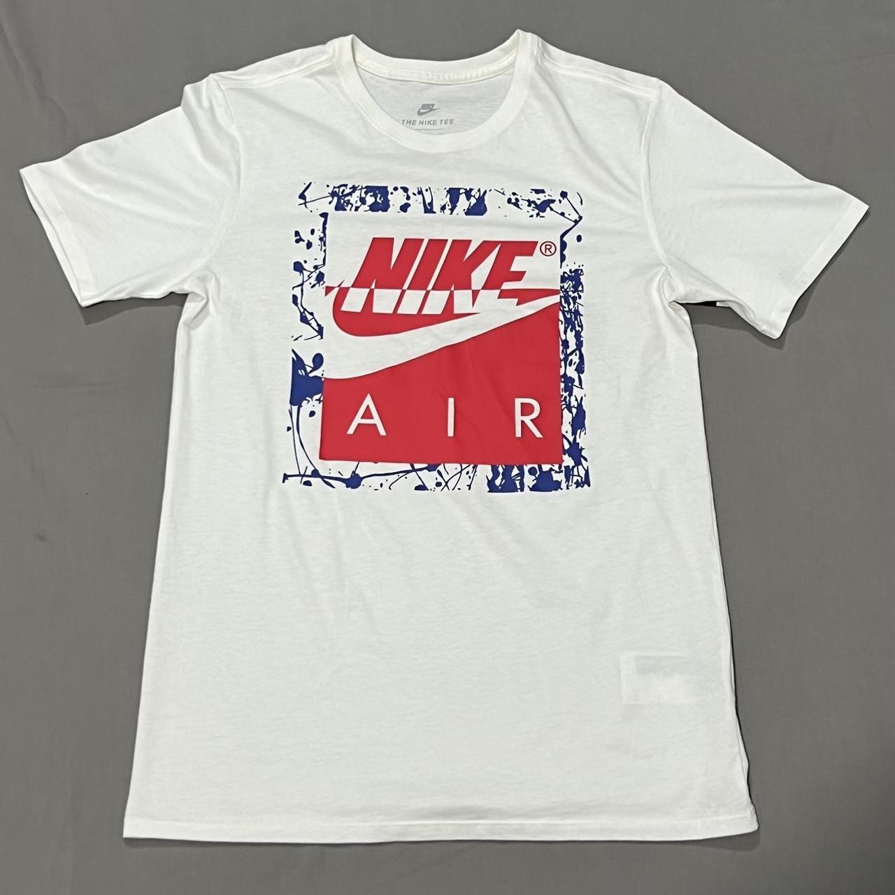 White Nike T shirt with red and blue