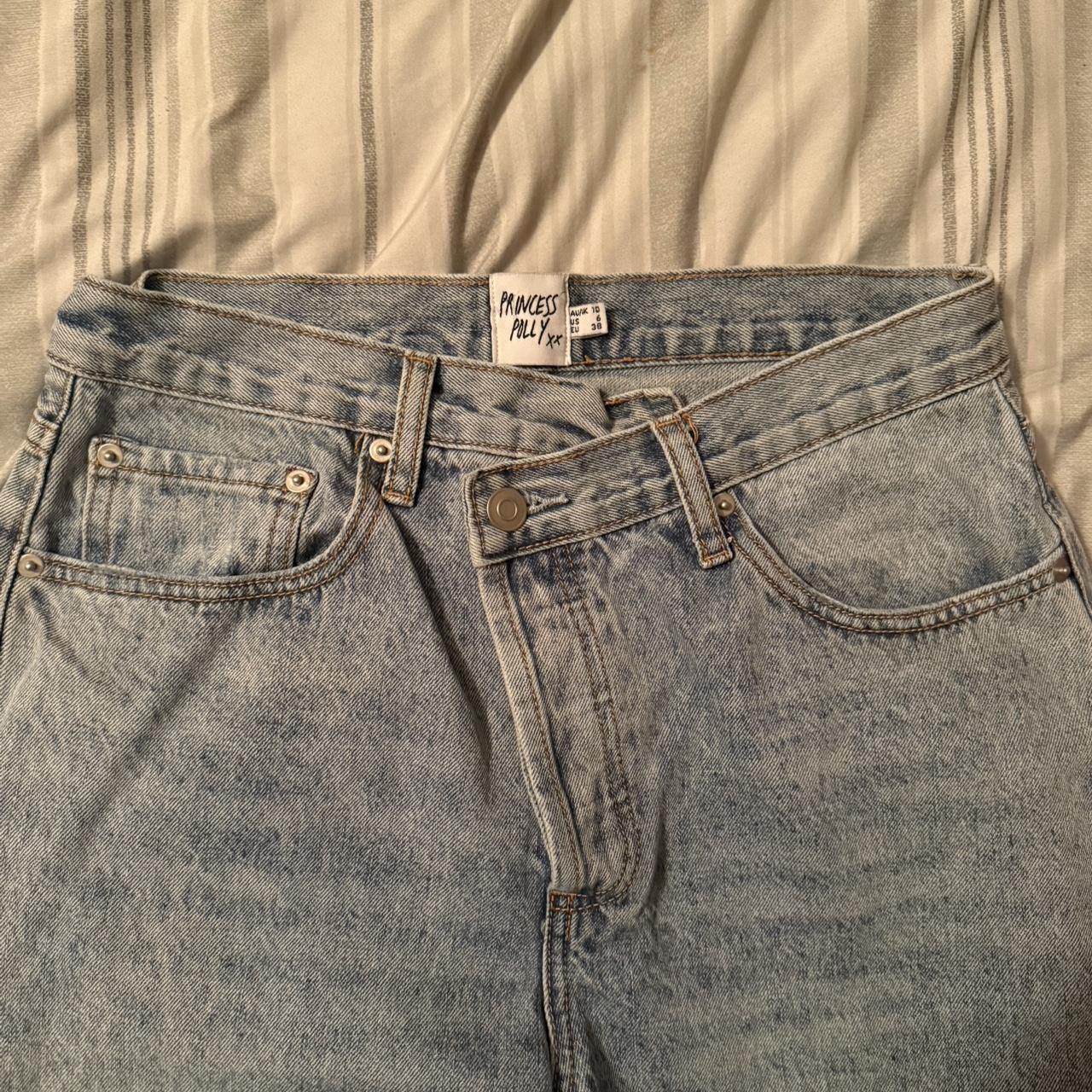 Princess Polly Women's Jeans - Blue - 6 – Light wash asymmetrical belt high-waisted #highwaistedjeans
