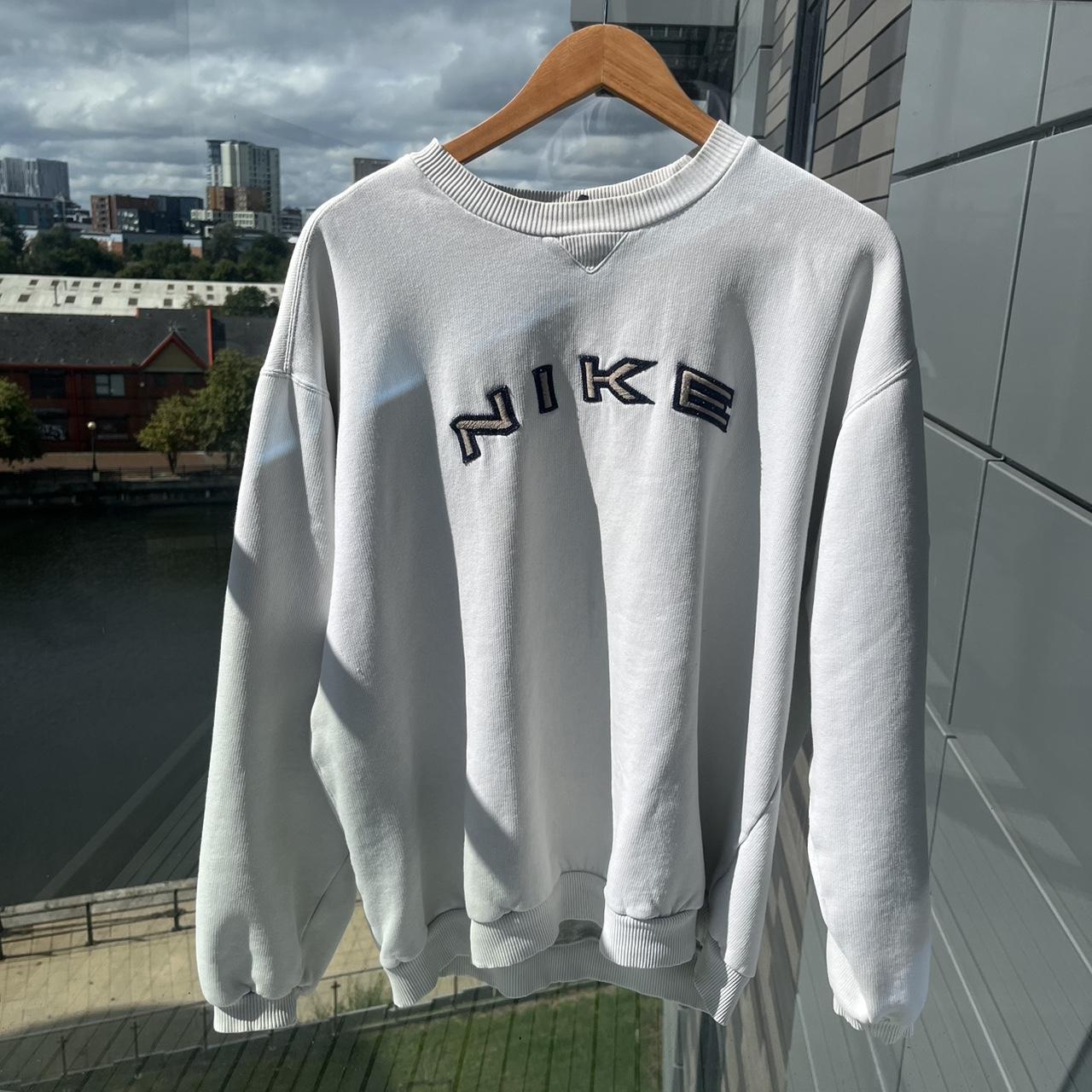 nike vintage cream sweaters