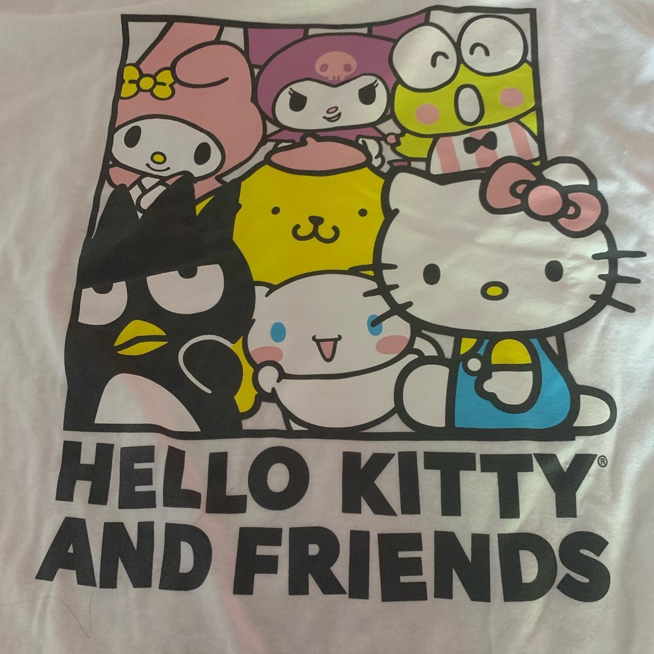 white Hello Kitty design t-shirt with four tiny - Depop