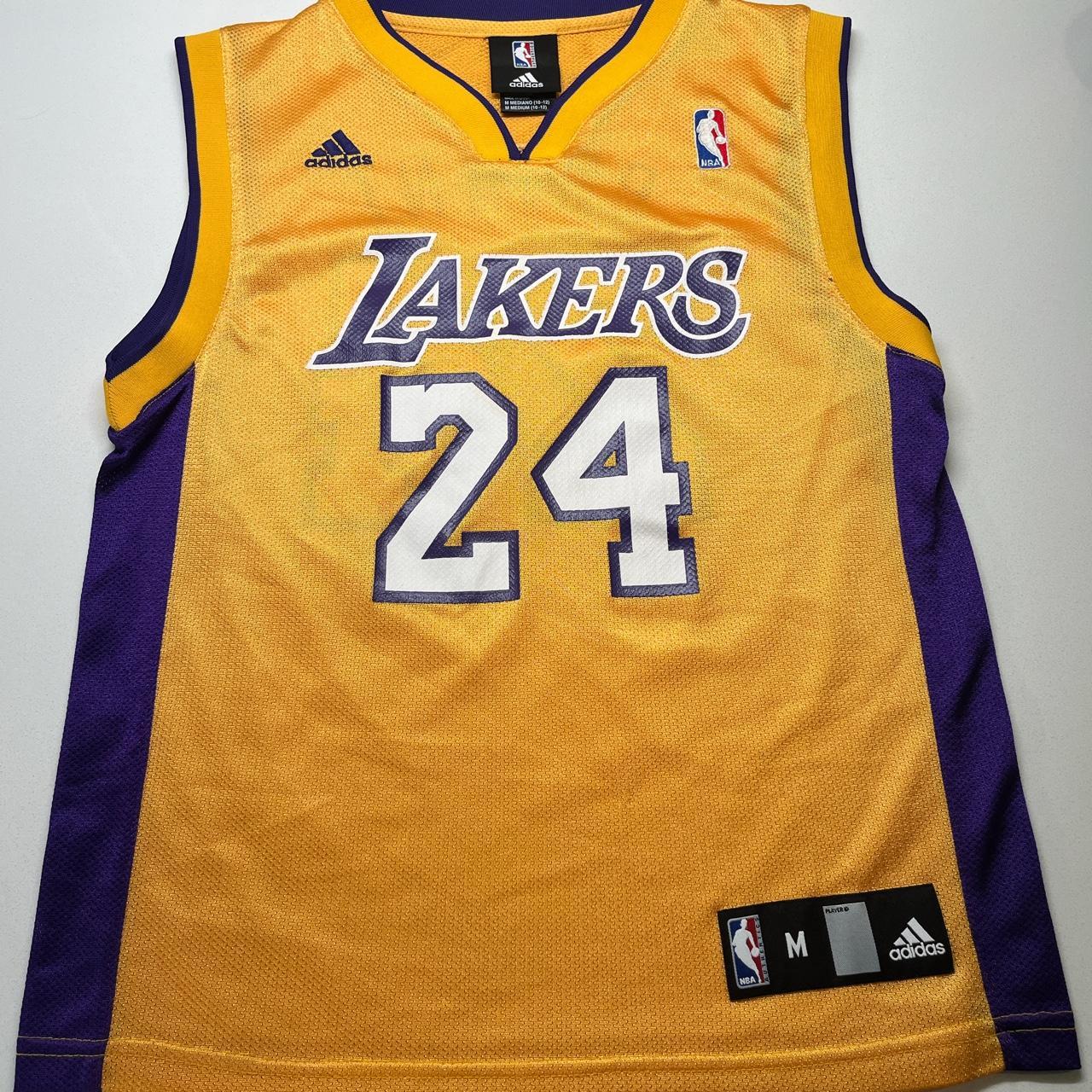 Yellow and purple Kobe Bryant jersey. 7/10... - Depop