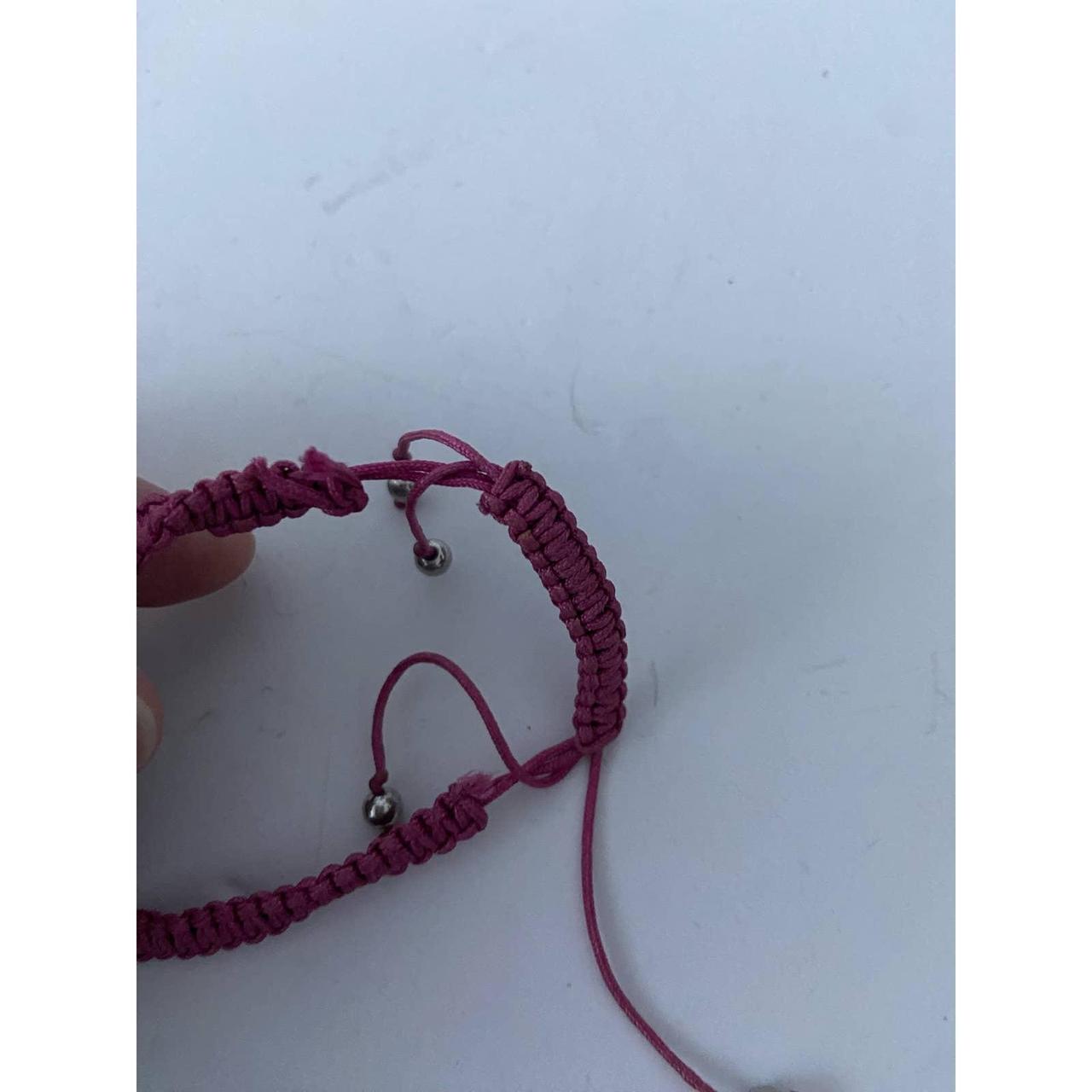 Stylish Juicy couture pink cord bracelet with - Depop