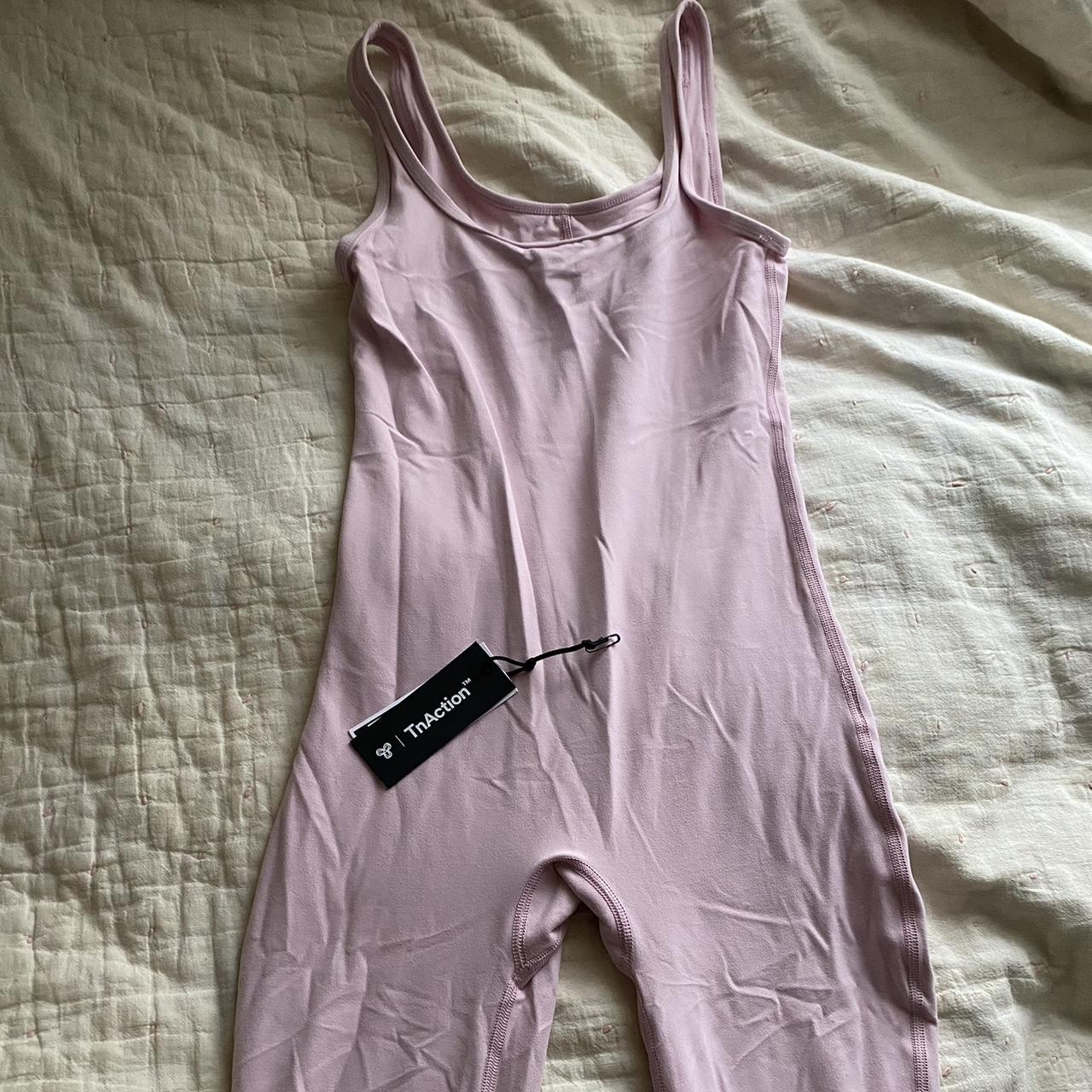 aritzia tna action butter onesie never worn still... Depop