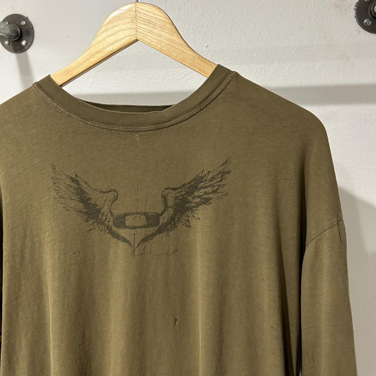 Y2K Oakley Wings and Skull Tee in good condition... Depop