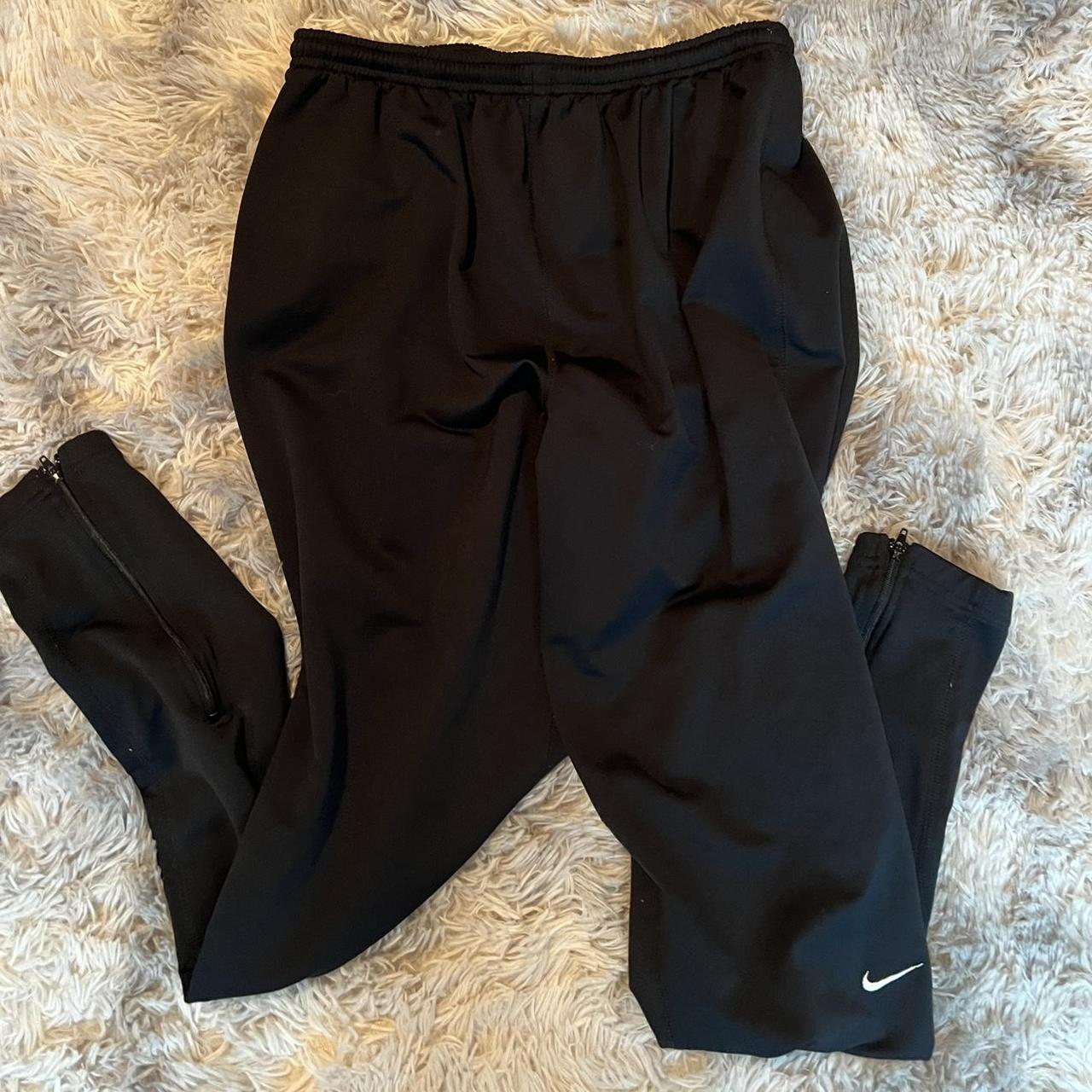 Nike sweatpants store with zipper bottom