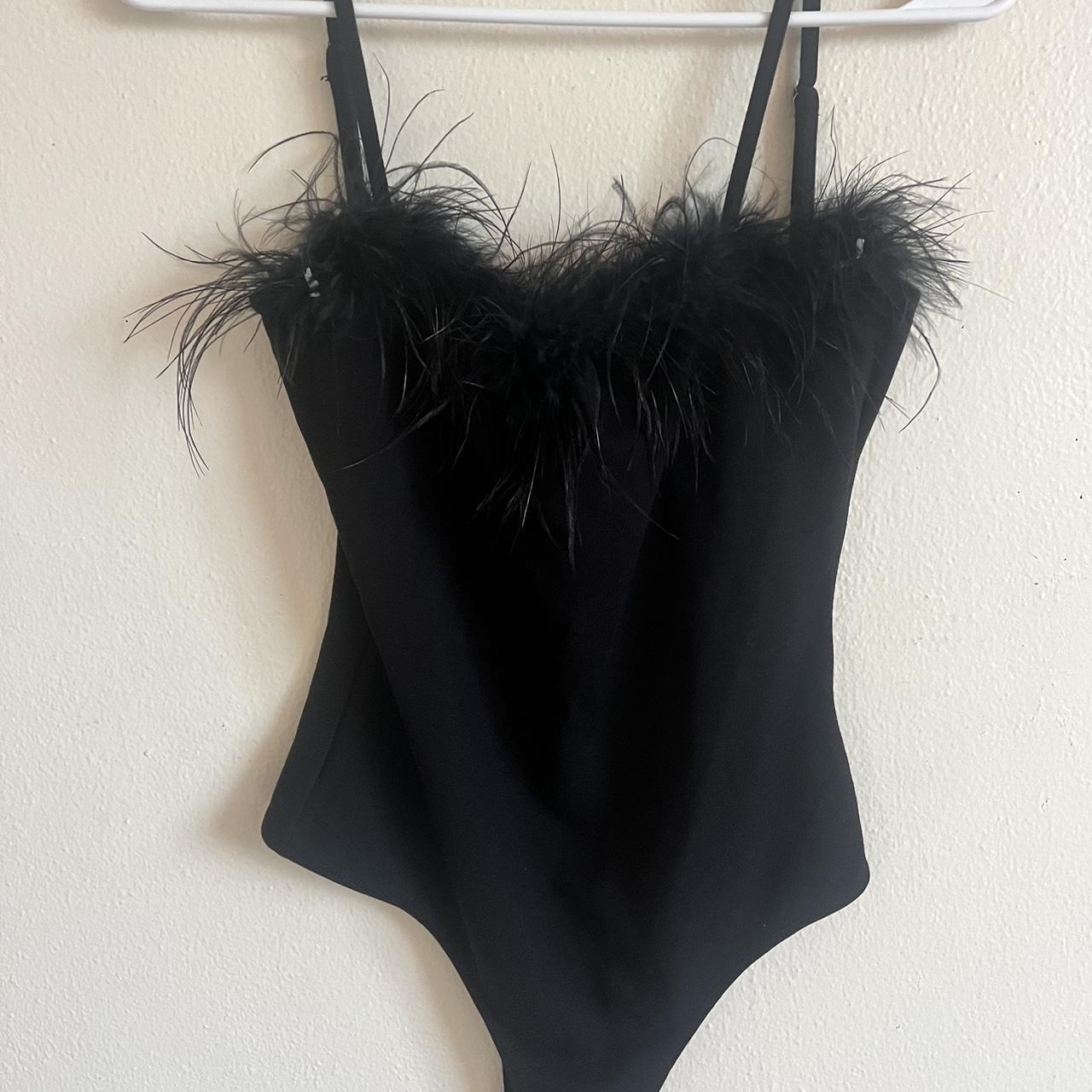 Lovely body suit with feather cuffs very unique, - Depop