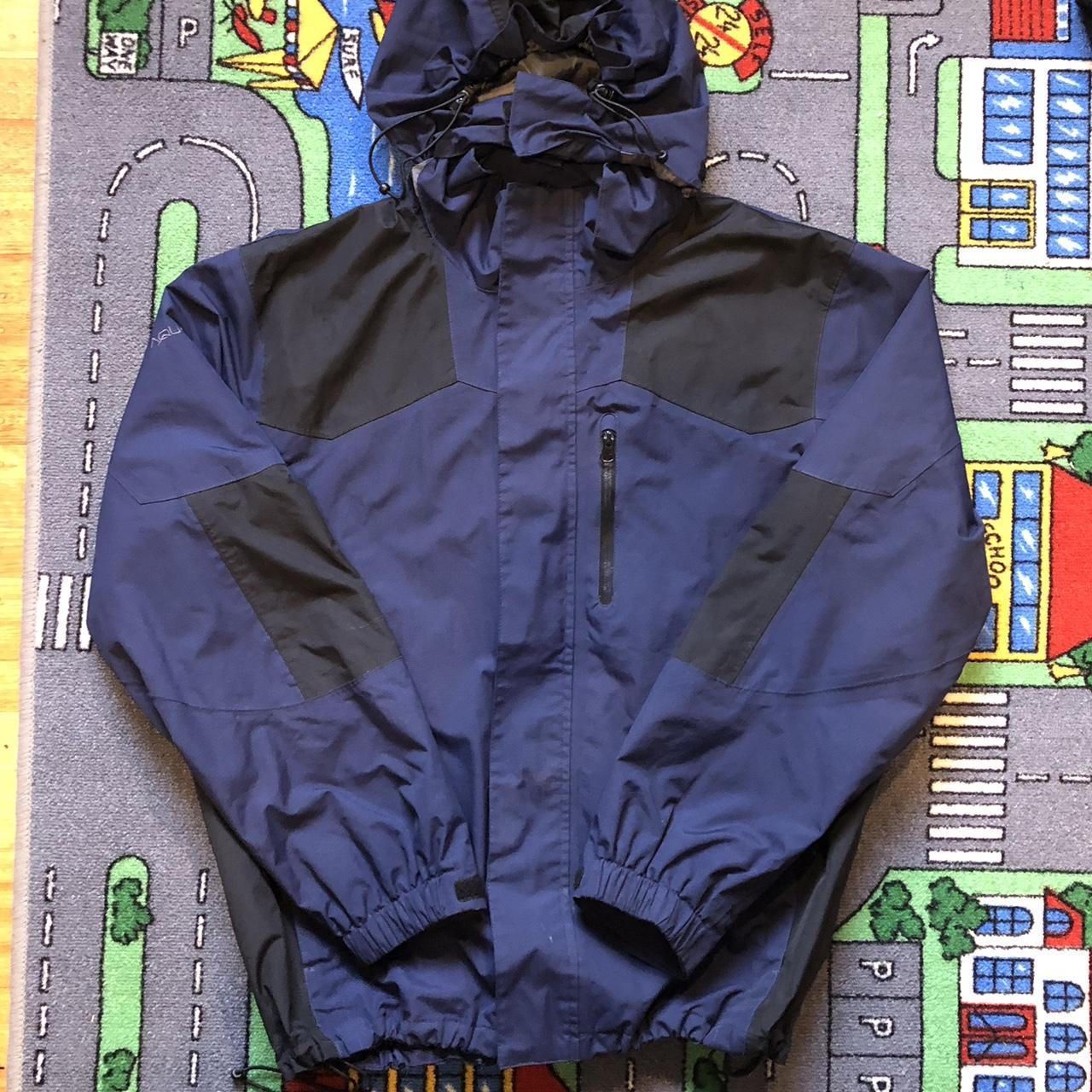 Gortex black and navy blue panelled jacket with... - Depop