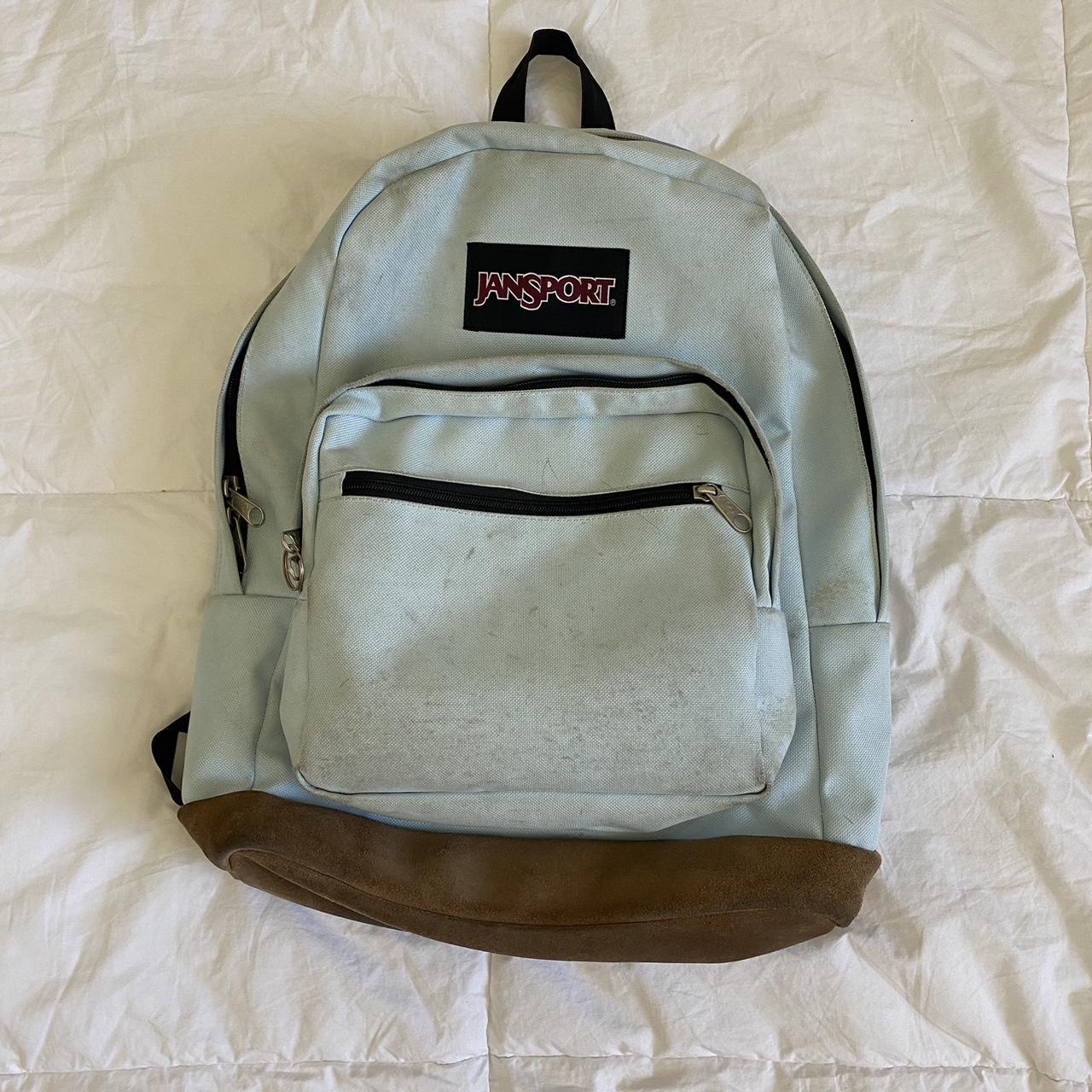 Baby blue Jansport backpack with brown accents Depop