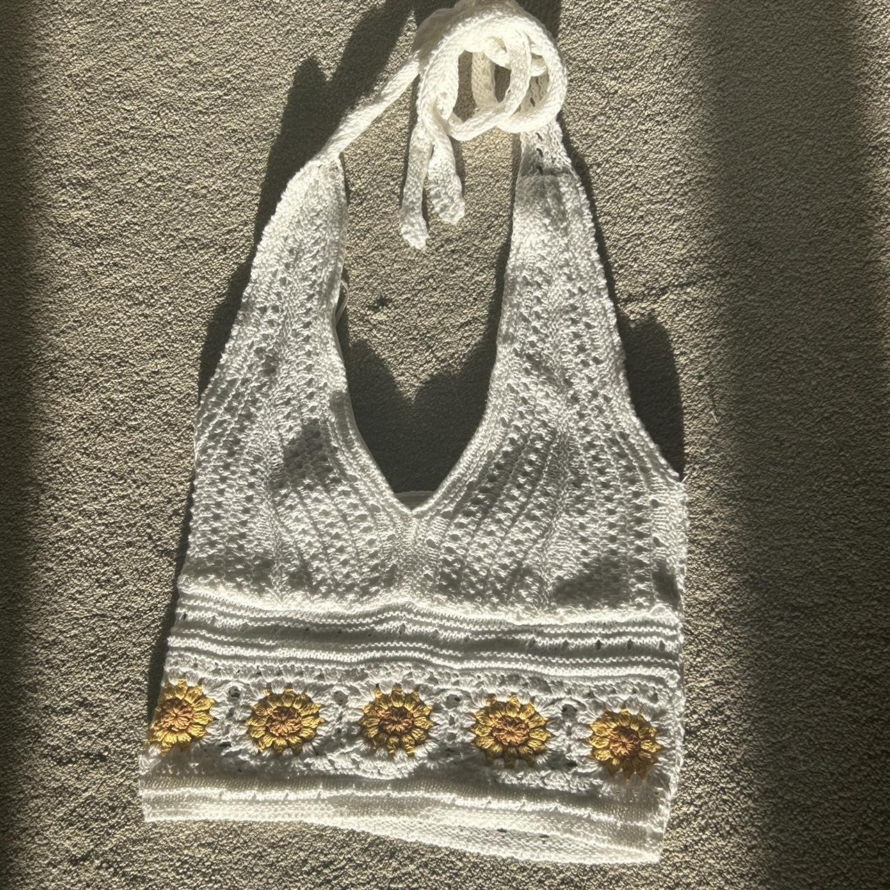 Hollister crochet halter top with sunflower pattern.... Depop