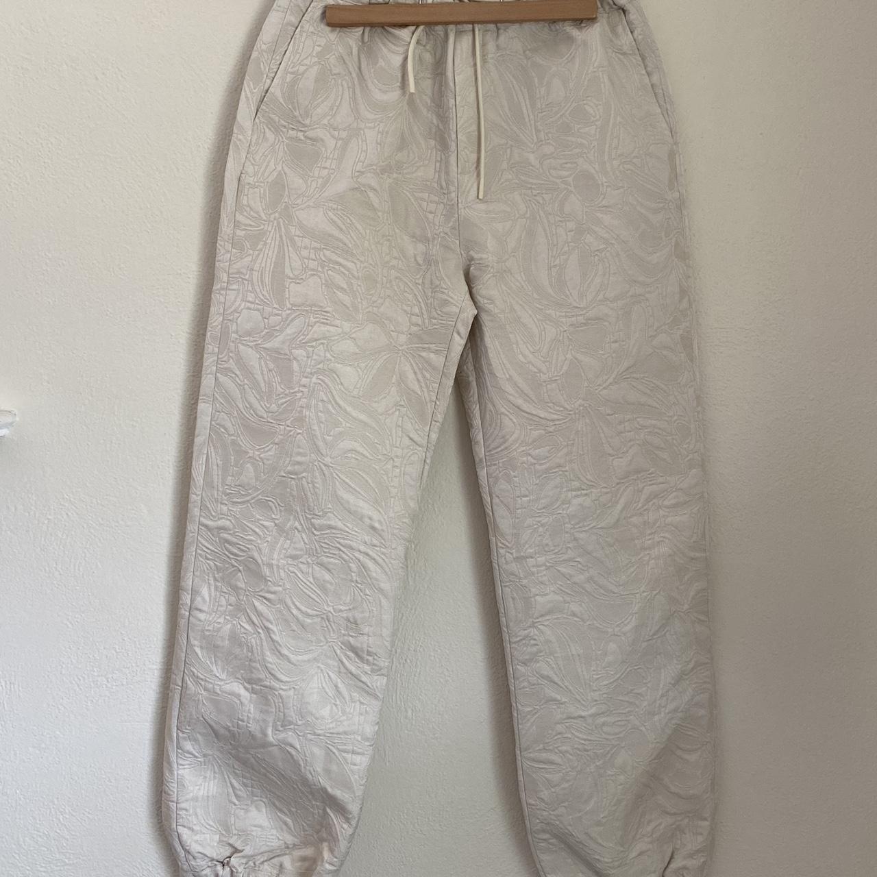 Stine Goya Women's Cream and White Trousers | Depop