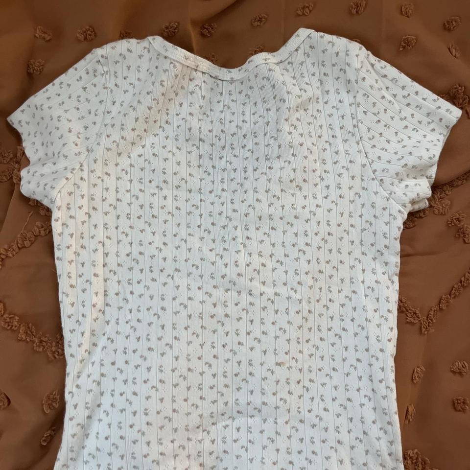 Brandy Melville Ivory with rose pink/sage floral - Depop