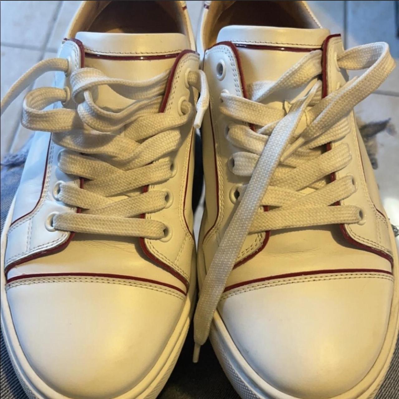 Gold hotsell louboutin sneakers