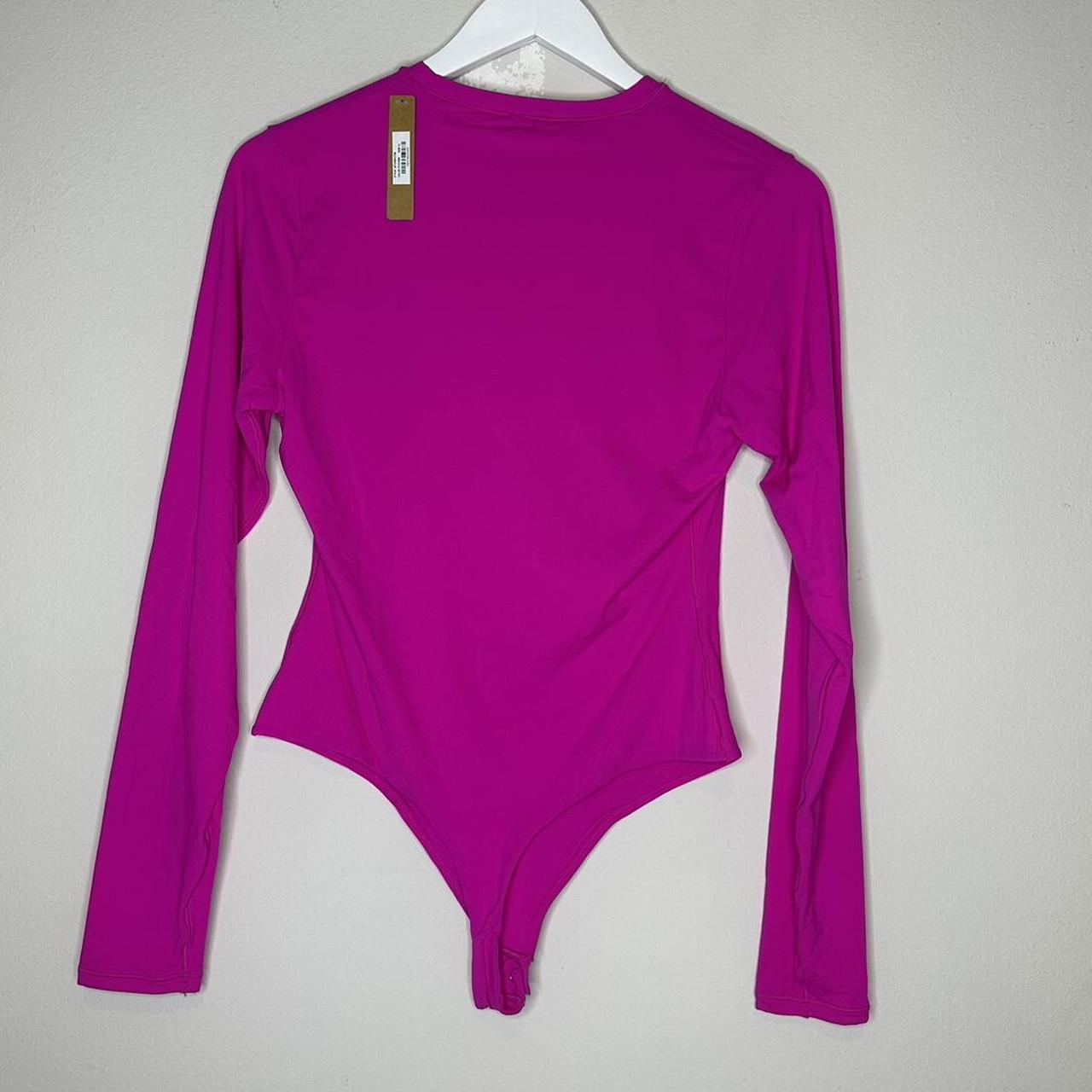 Skims Women's Pink Bodysuit Depop
