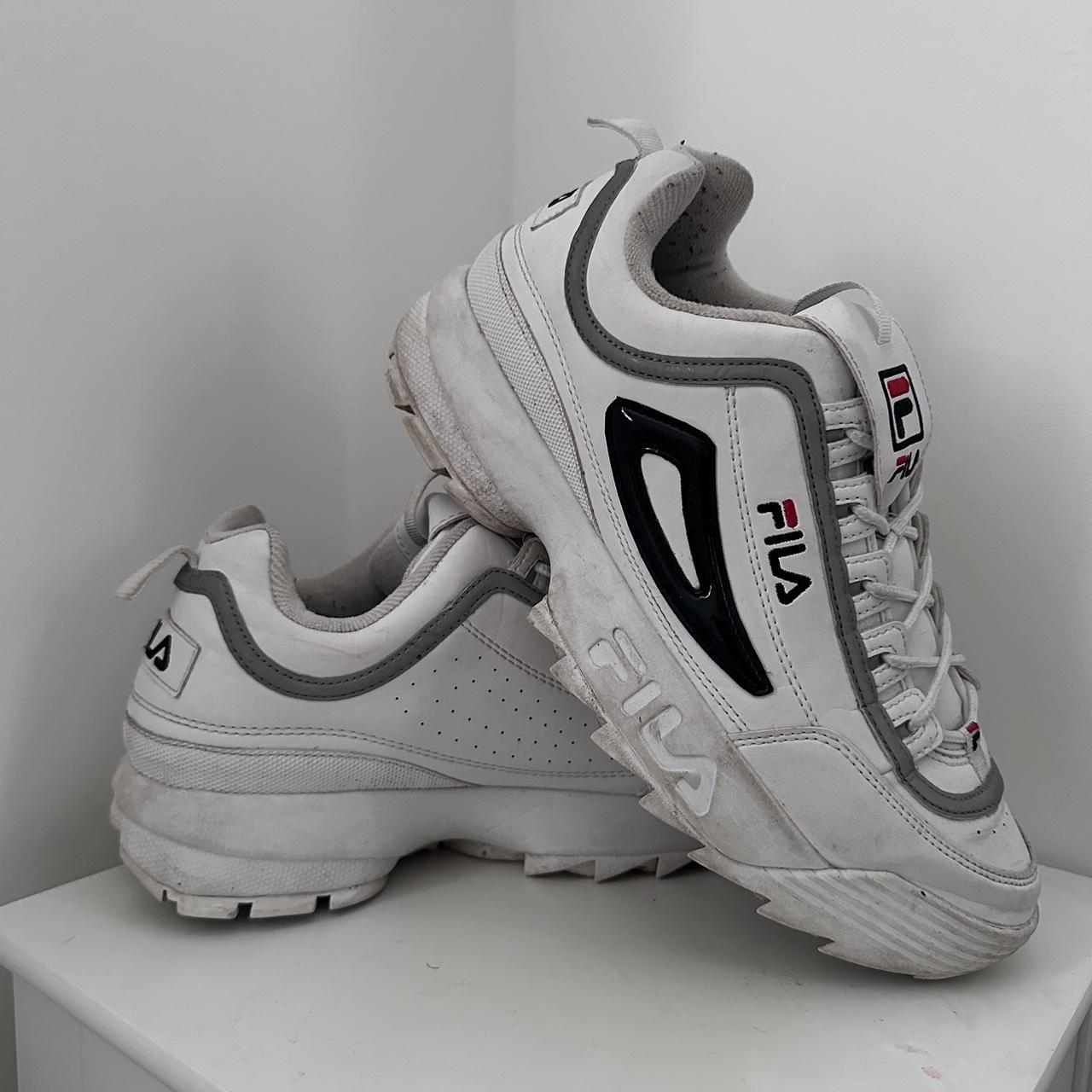 Men black and white fila trainers. Worn few times. Depop