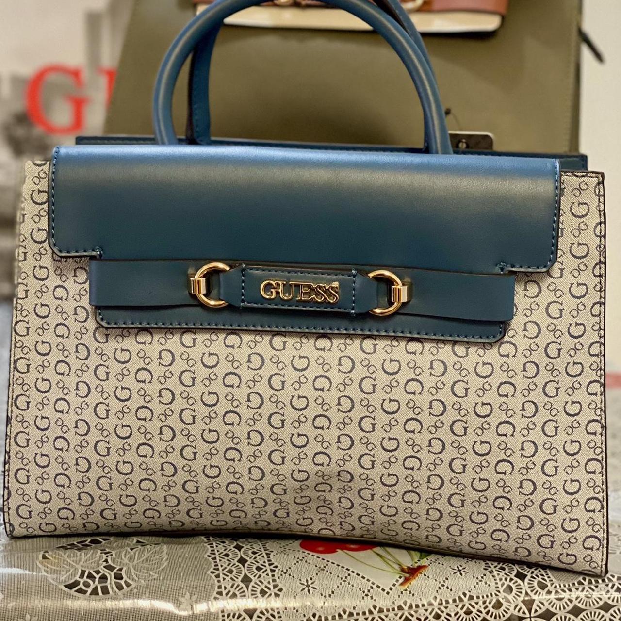 Blue guess purse deals