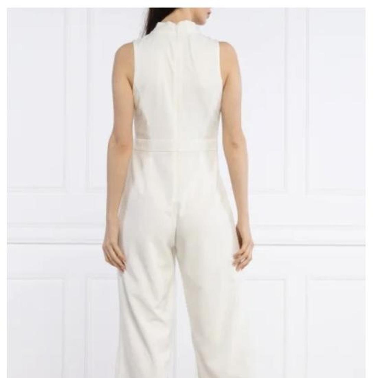 DKNY white jumpsuit size 8. Worn for hen party