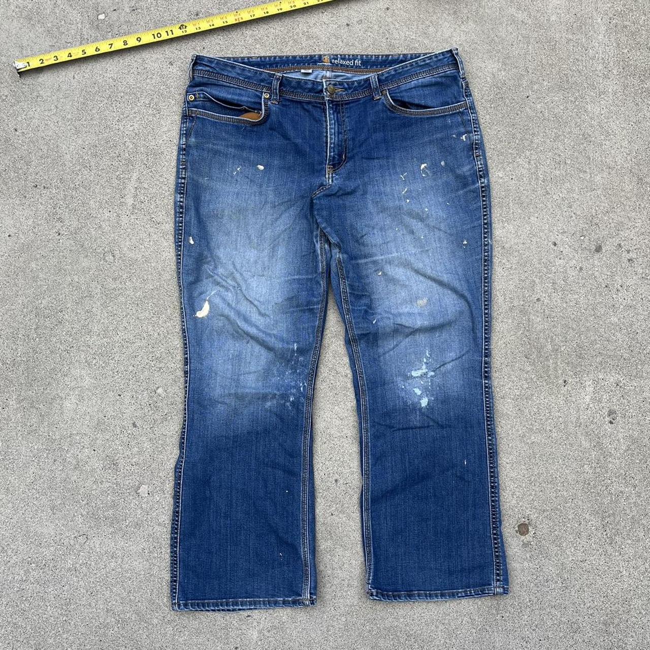 Faded wide leg Carhartt jeans with paint spots. 38x28 - Depop