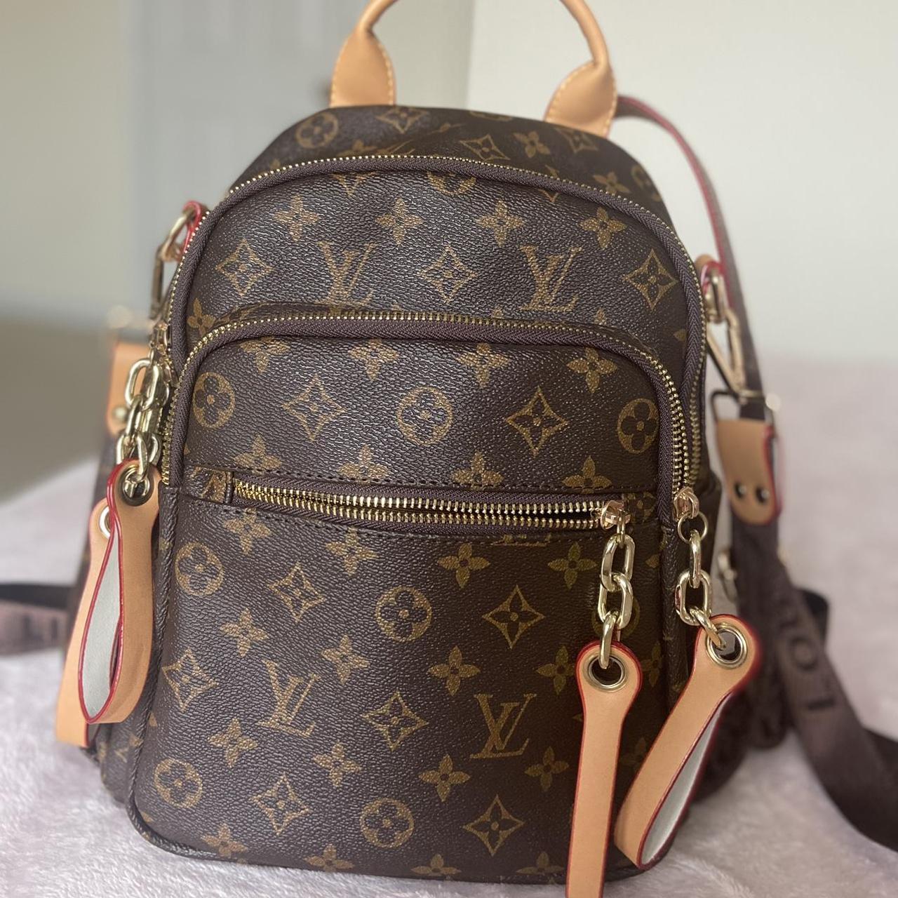 Louis Vuitton Mini backpack, Authentic and in... Depop