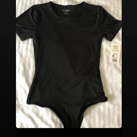 basic black bodysuit , never worn , new with tags