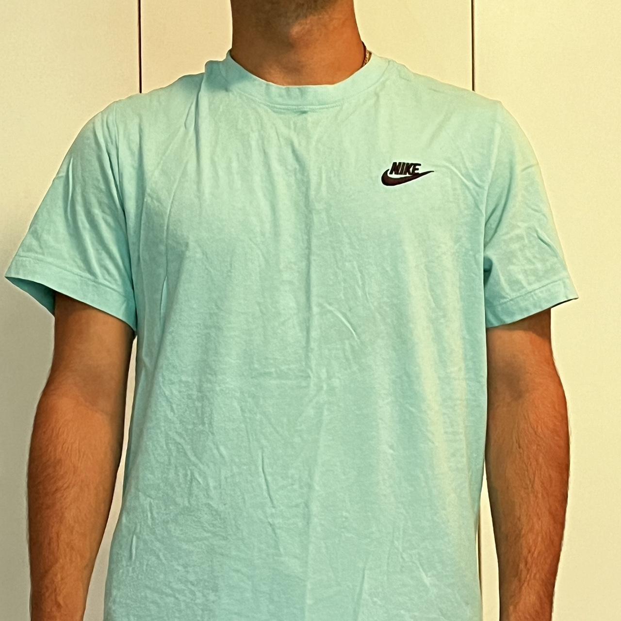 1990s Nike aqua teal t-shirt with black Nike