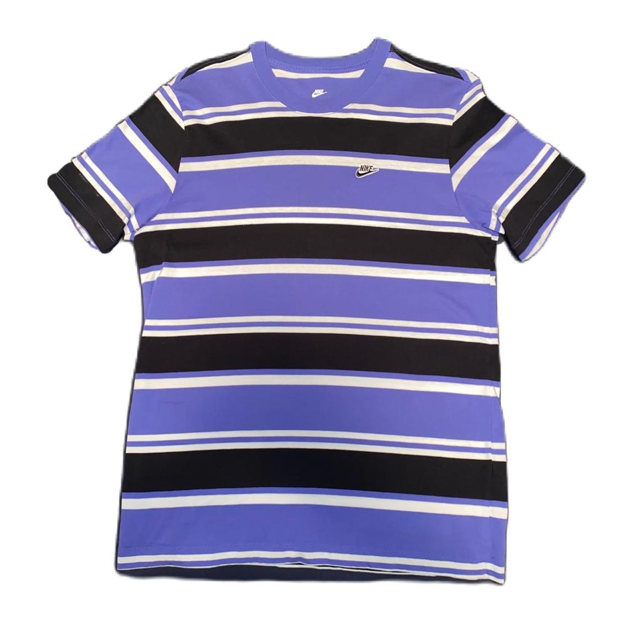 purple black and white nike shirt