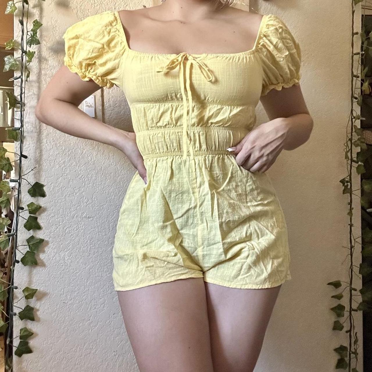 Beautiful yellow romper. Slightly sheer but never... Depop