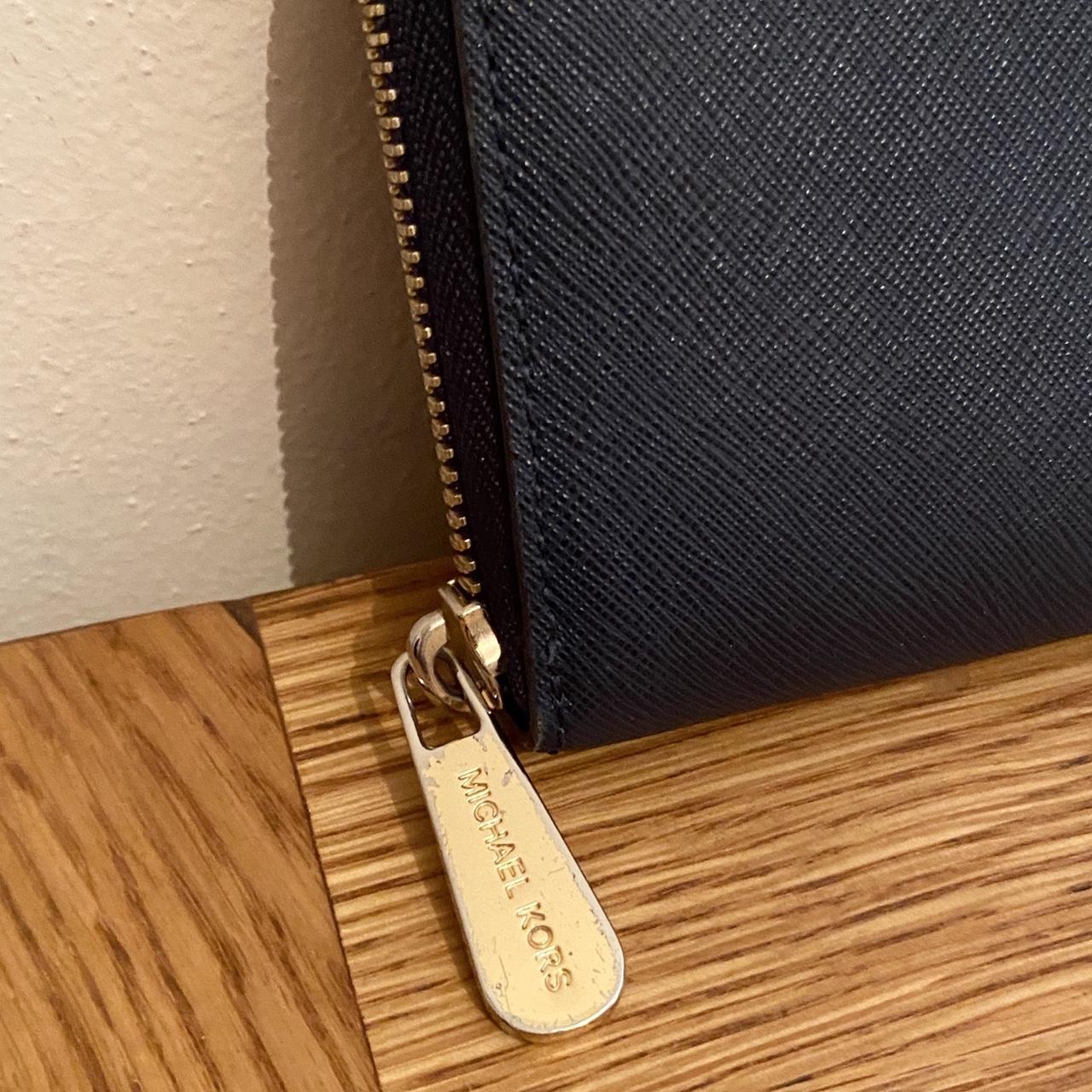 Michael Kors navy blue and gold leather purse.... - Depop