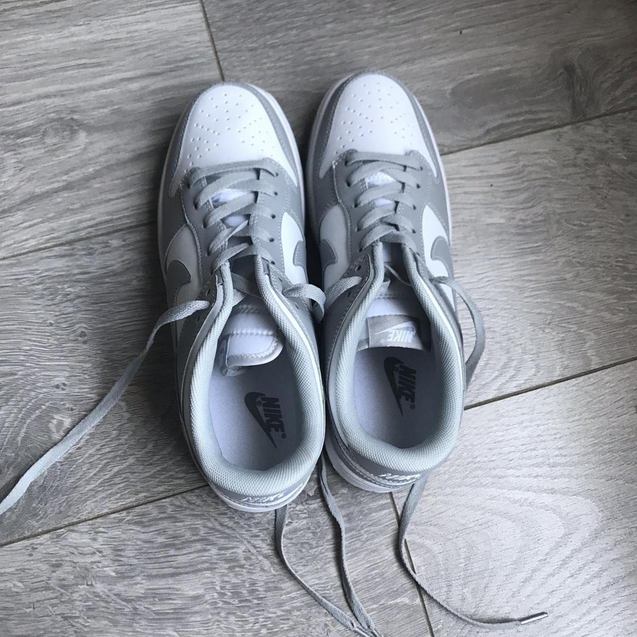 mens grey and white nike shoes