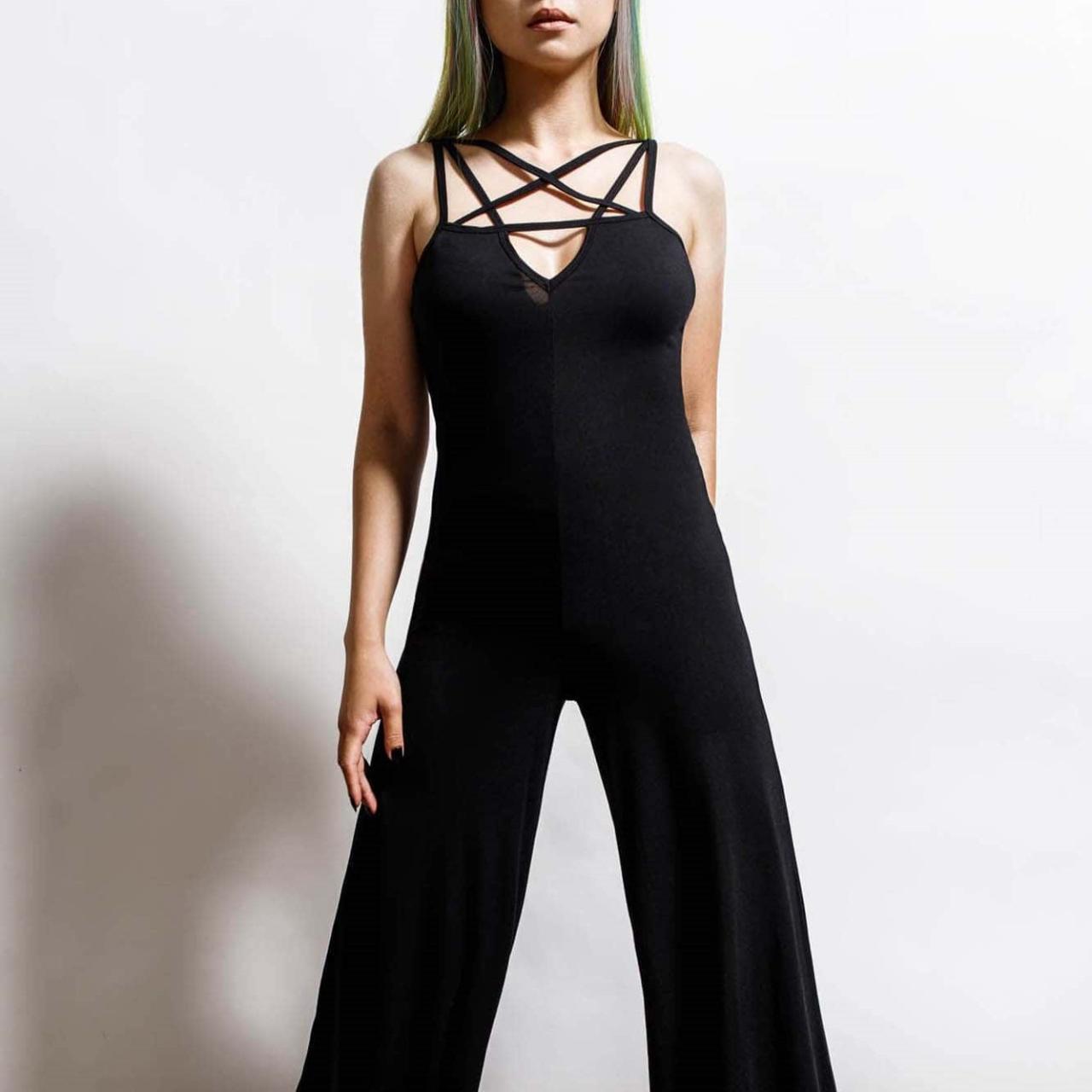 DIM THE LIGHTS Jumpsuit There is a small hole in... Depop